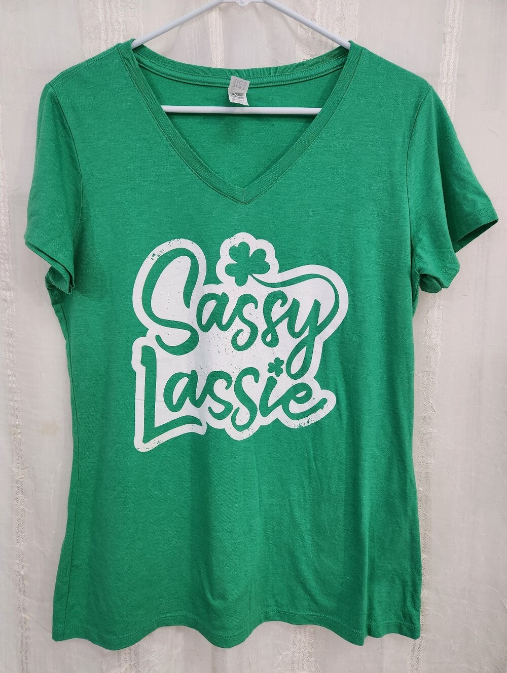 District Green V‑Neck Tee with White 'Sassy Lassie' Graphic